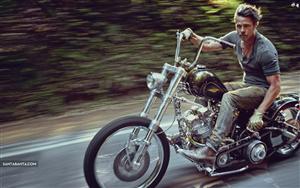 Hollywood heart-throb Brad Pitt riding a motorcycle in New York to ABC TV